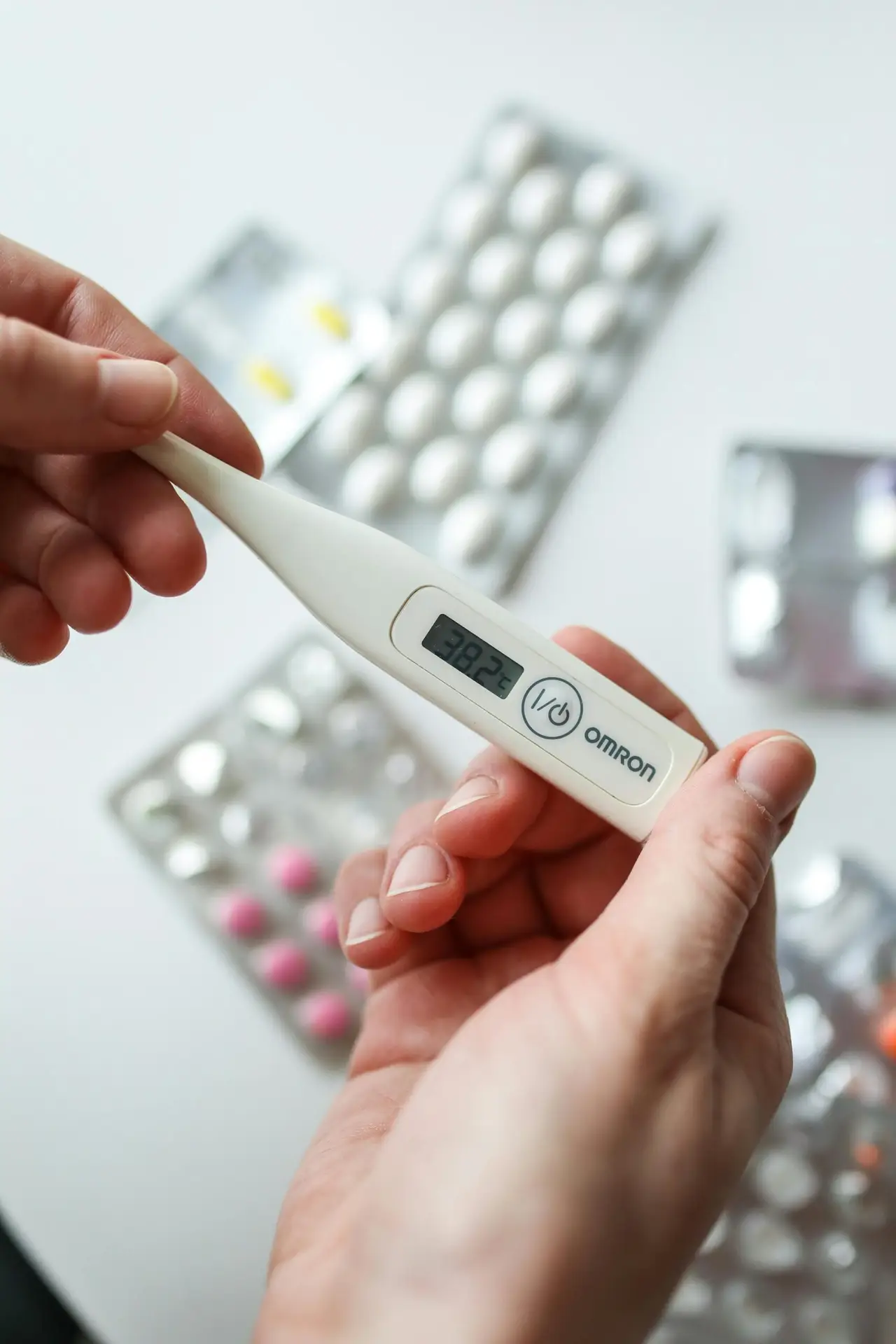 Photo Of Person Holding Digital Thermometer